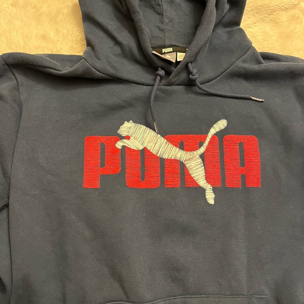Mens puma pullover sweatshirt navy blue with red lettering, large , with hood.